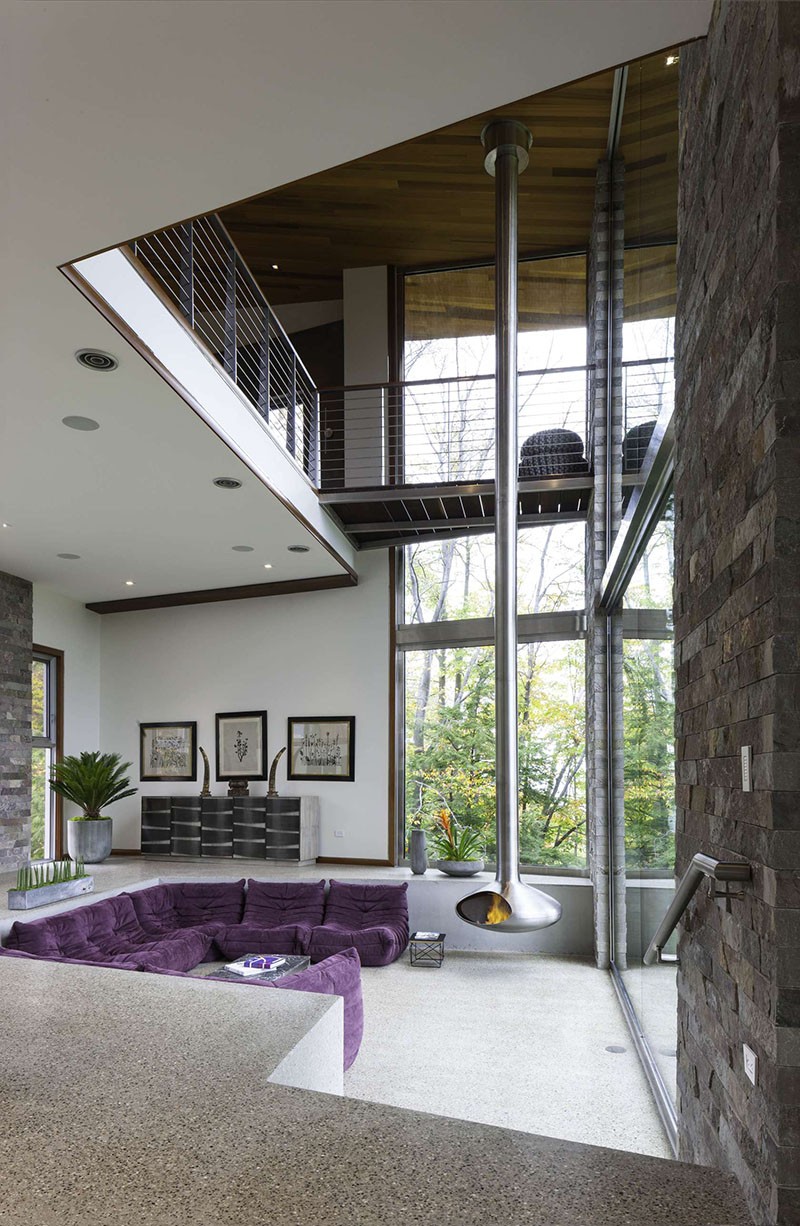 A hanging fireplace in a house in Michigan