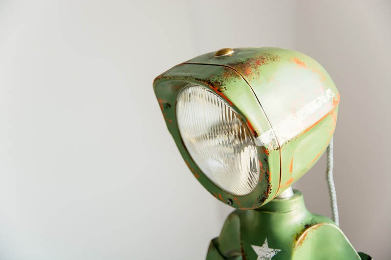 This lamp looks like a little robot man