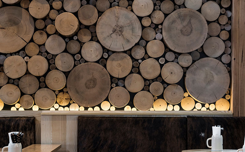 A Giant Log Wall Is A Focal Point In This Restaurant In Australia