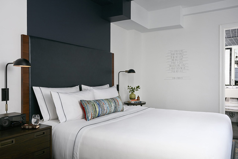 Design Detail - The headboards and paintwork in this hotel suite, are designed to define the space for the bed.