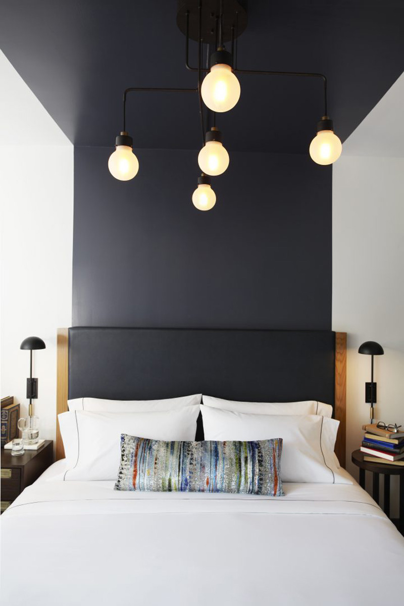 Design Detail - The headboards and paintwork in this hotel suite, are designed to define the space for the bed.