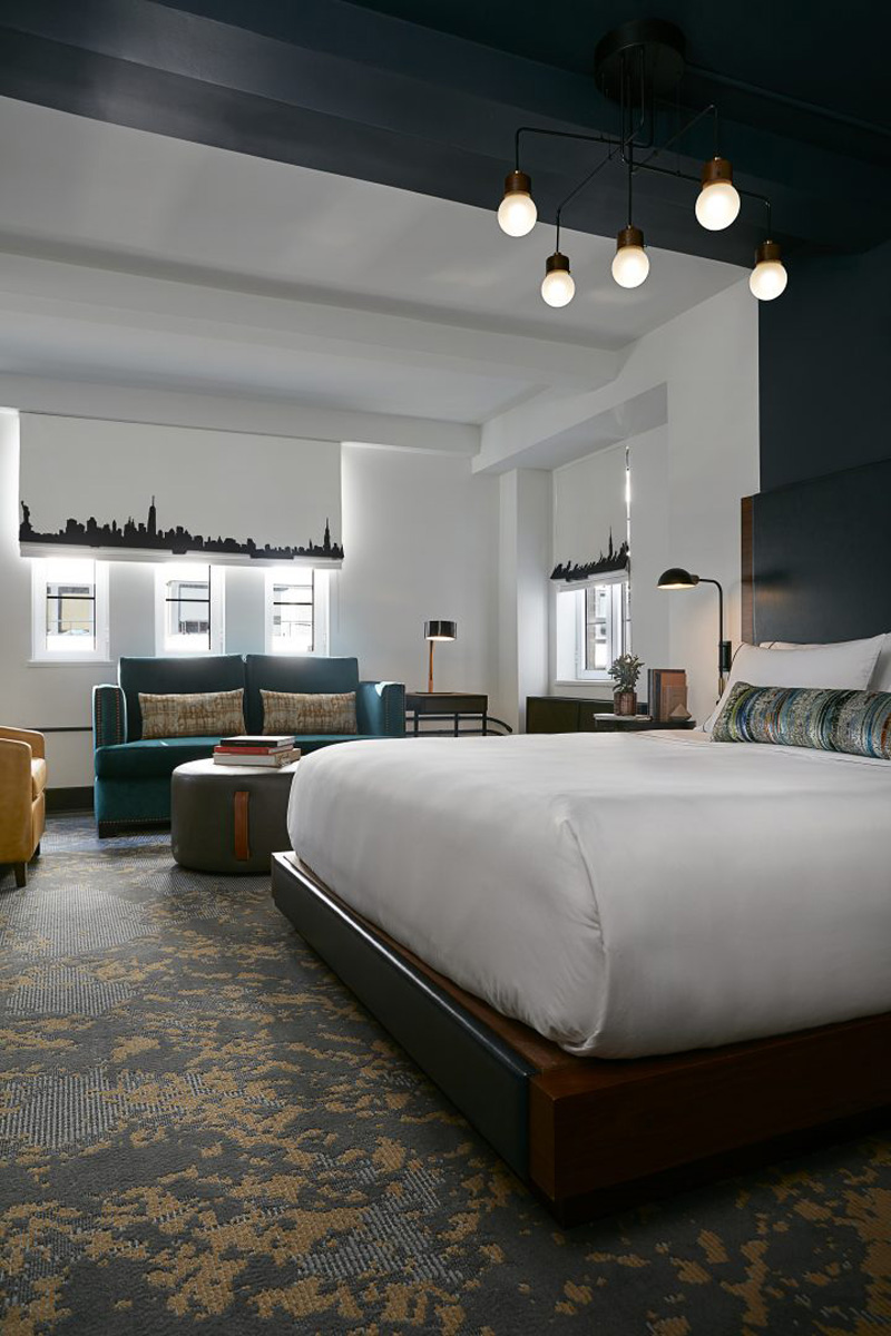 Design Detail - The headboards and paintwork in this hotel suite, are designed to define the space for the bed.