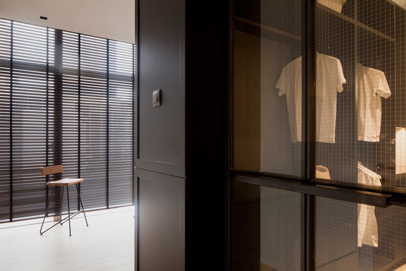 A modern apartment with a walk-in closet. #WalkInCloset #ModernApartment #InteriorDesign #ClosetDesign