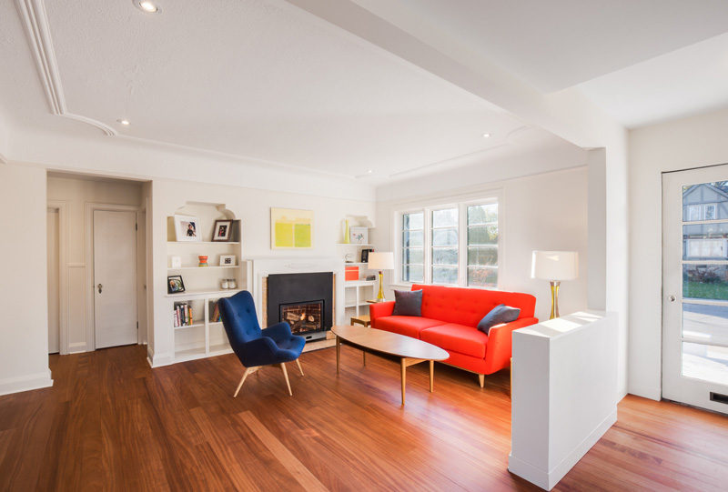 In this renovated home, touches of the original home have been kept, like the built-in bookshelves.