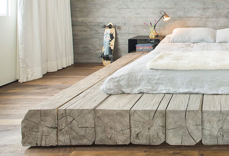 This bed platform has been made using reclaimed logs