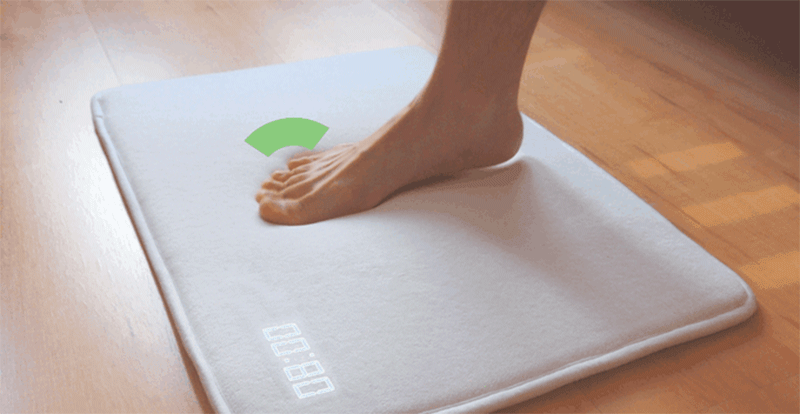 This rug alarm clock forces you to get out of bed and stand on it