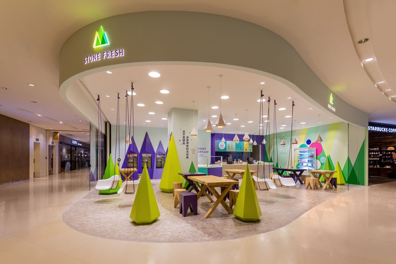 A playful theme of abstract trees and mountains were designed for this frozen yogurt shop