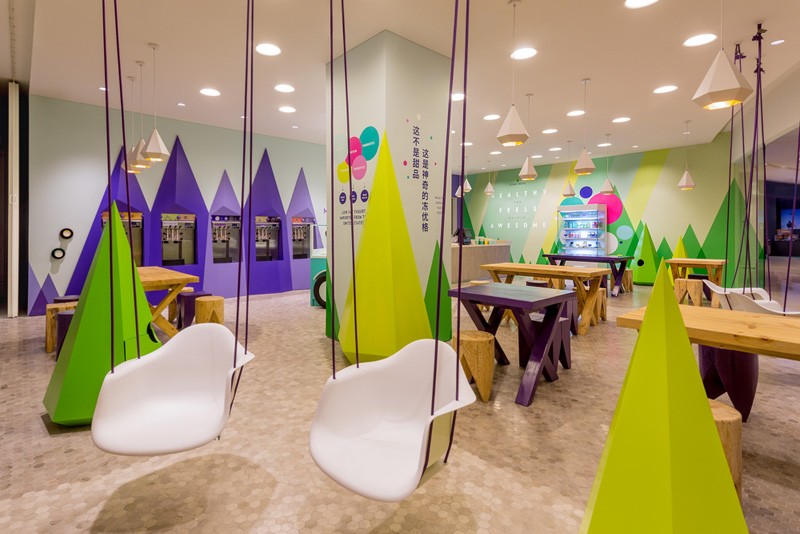 A playful theme of abstract trees and mountains were designed for this frozen yogurt shop