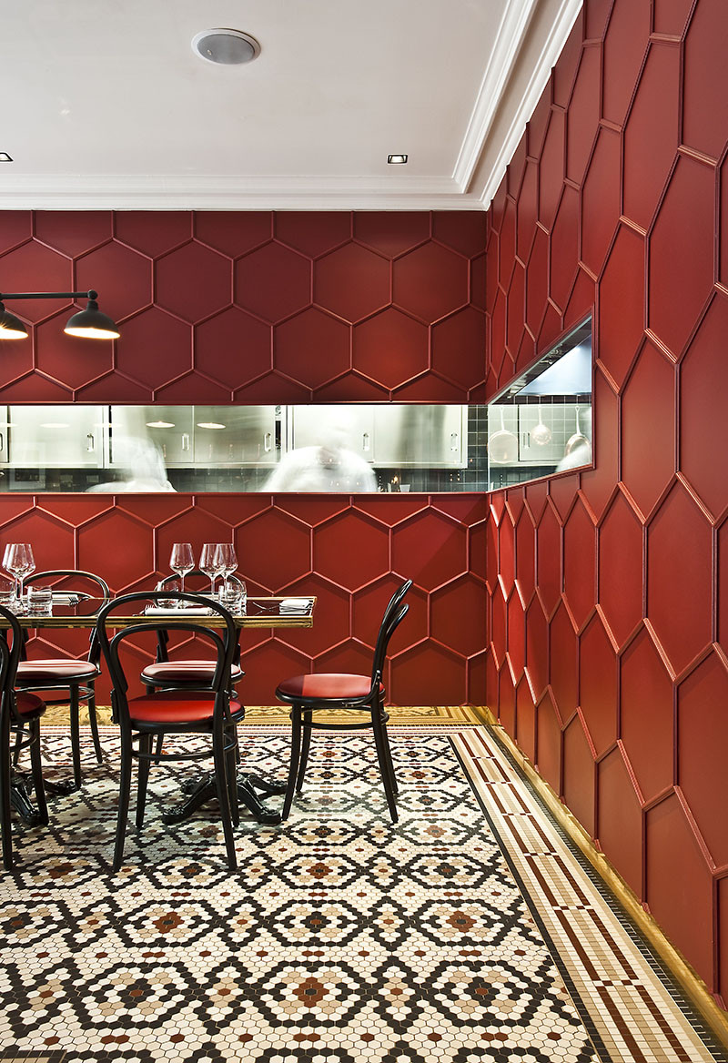 Moulding was used to create a 3D honeycomb pattern on this restaurant’s walls