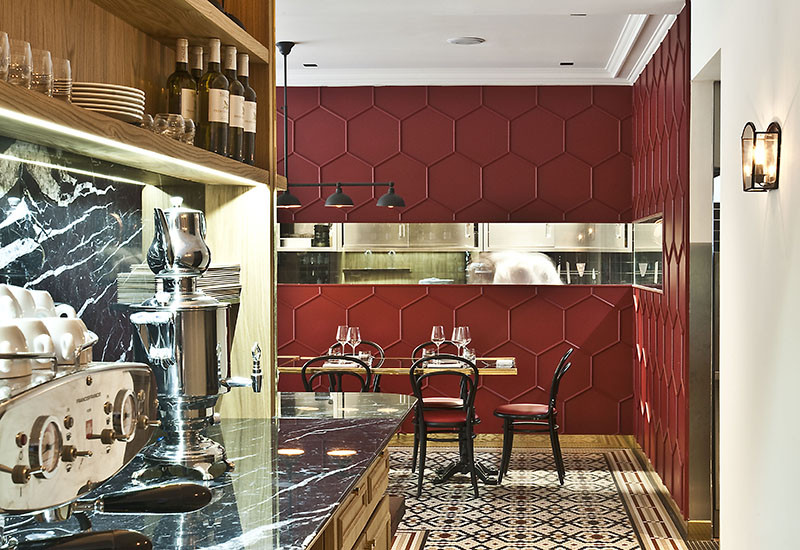 Moulding was used to create a 3D honeycomb pattern on this restaurant’s walls