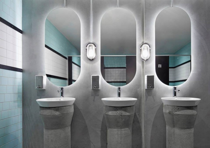 8 Reasons Why You Should Have A Backlit Mirror In Your Bathroom // They're Easy To Install --- You can run a strip of LED lights behind the mirror yourself and connect to a power source, or you can buy a pre-lit mirror and have it installed. 