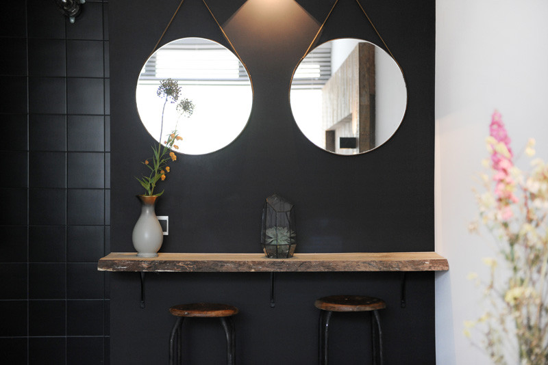 Before & After - An home gets updated with lots of wood and touches of black