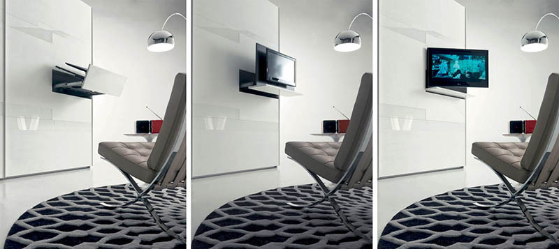 This television is hidden within a pullout tv-rack in the wardrobe