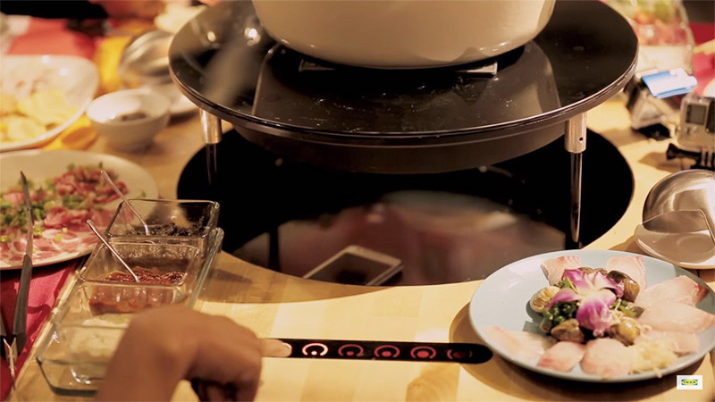 This IKEA Hotplate Table Makes You Put Your Phone Away Before It Will Cook Your Food