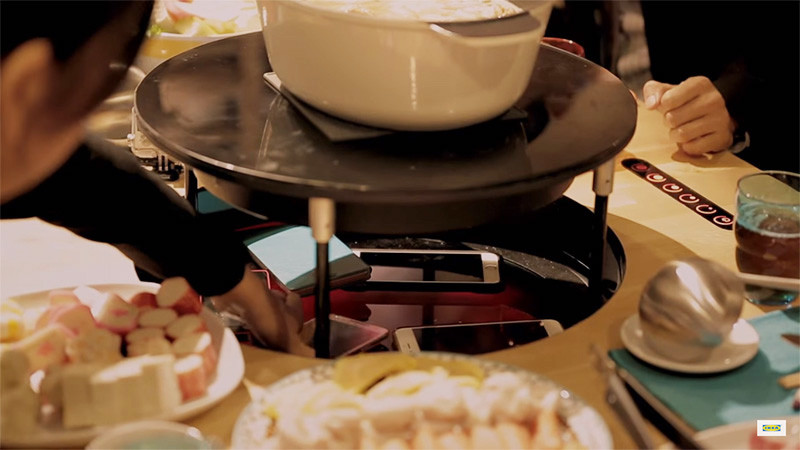 This IKEA Hotplate Table Makes You Put Your Phone Away Before It Will Cook Your Food