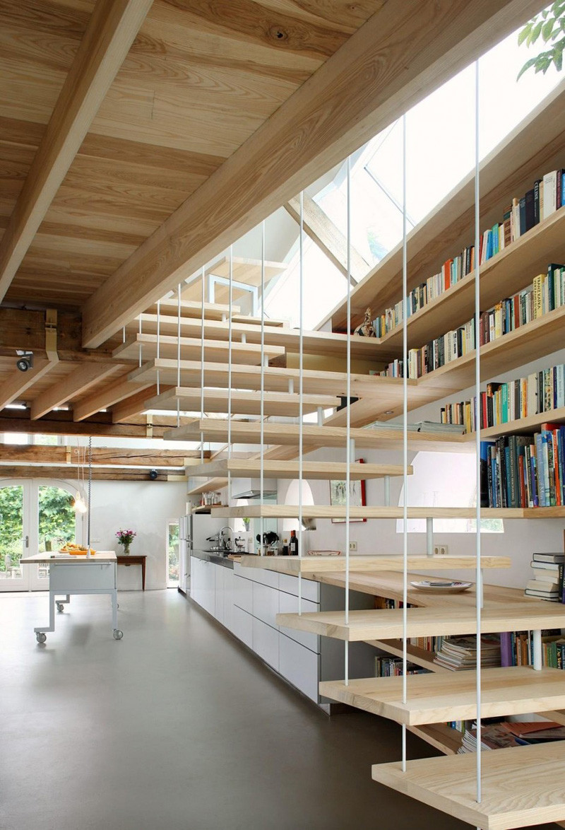 8 examples of stairs that do double-duty as bookshelves