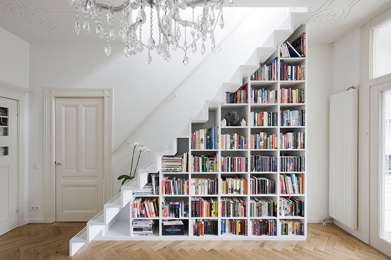 8 examples of stairs that do double-duty as bookshelves