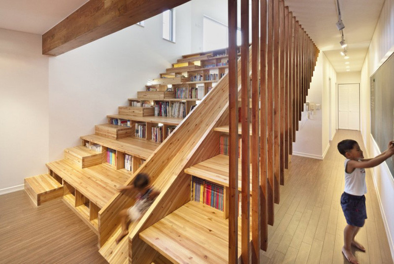 8 examples of stairs that do double-duty as bookshelves