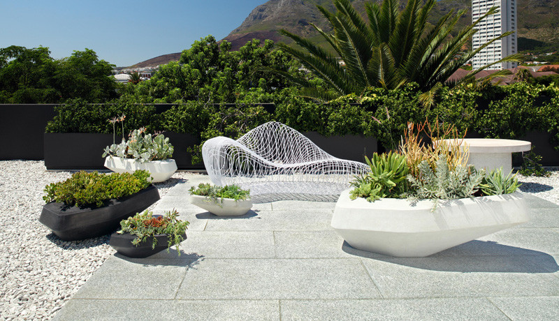 The design of these planters was inspired by jutting granite boulders found along the Cape Town coast in South Africa