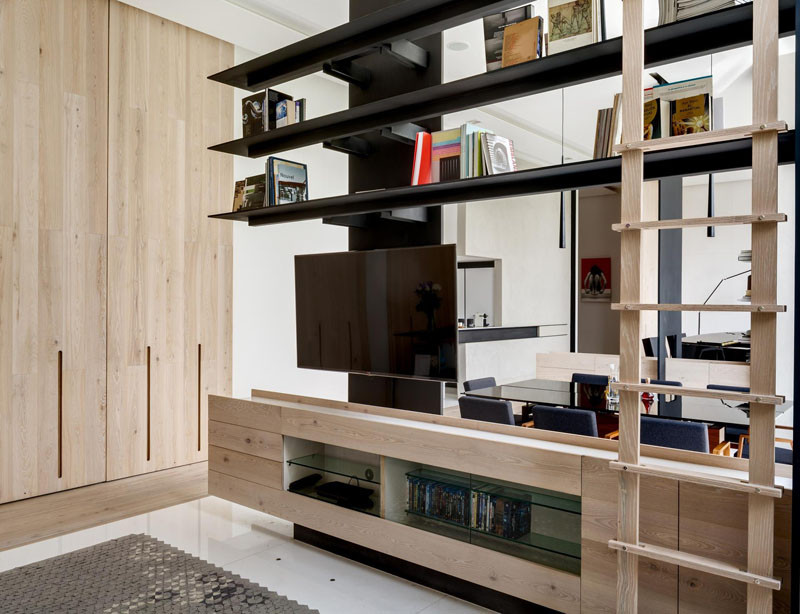 See how this apartment has the living area divided into three defined spaces without the use of walls