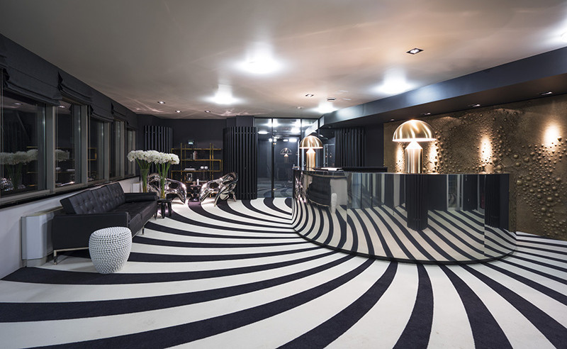 A Hypnotic Carpet Covers The Floor Of This Reception Area