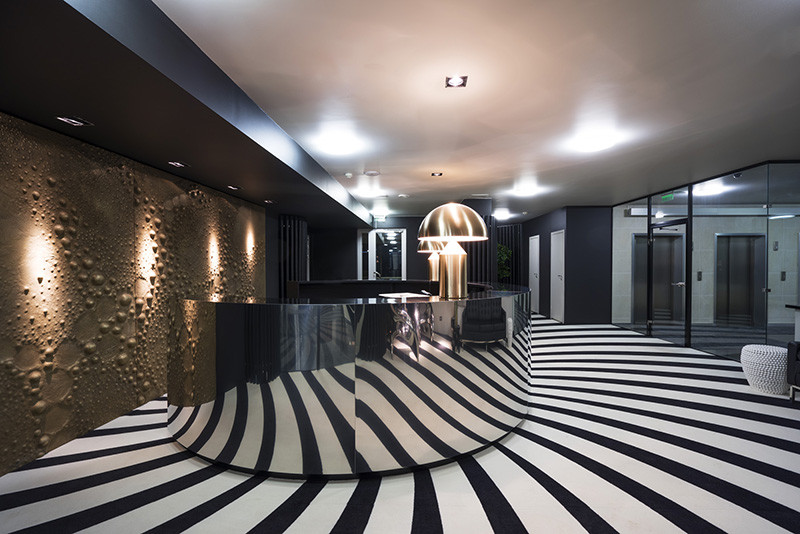 A Hypnotic Carpet Covers The Floor Of This Reception Area
