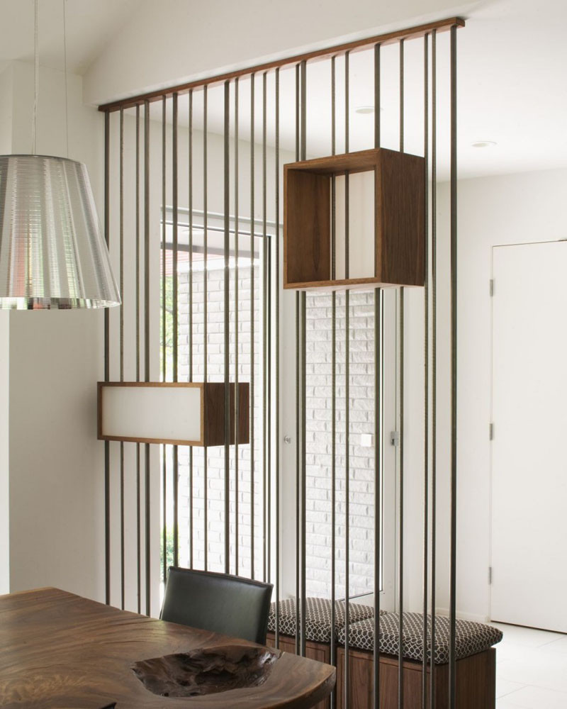 Design Detail - Metal Rods & Wooden Boxes Have Been Used To Create A Partition Wall