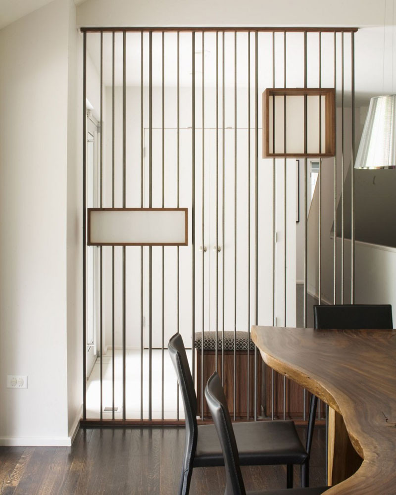 Design Detail - Metal Rods & Wooden Boxes Have Been Used To Create A Partition Wall