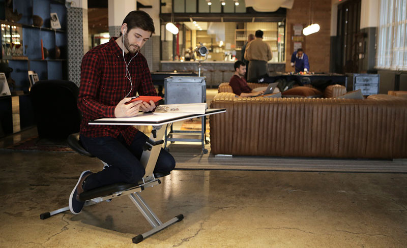 The Edge, a foldable ergonomic desk/chair/easel combo.