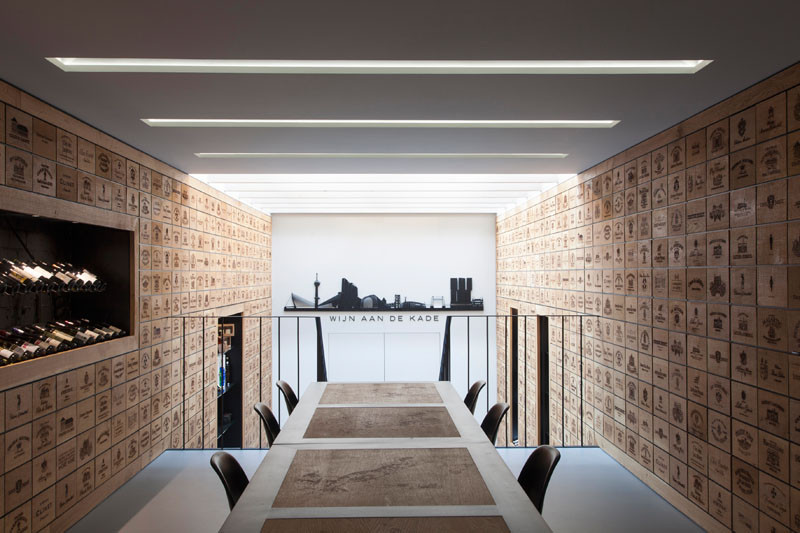 2100 Engraved Oak Panels Line The Walls Of This New Wine Shop In Rotterdam