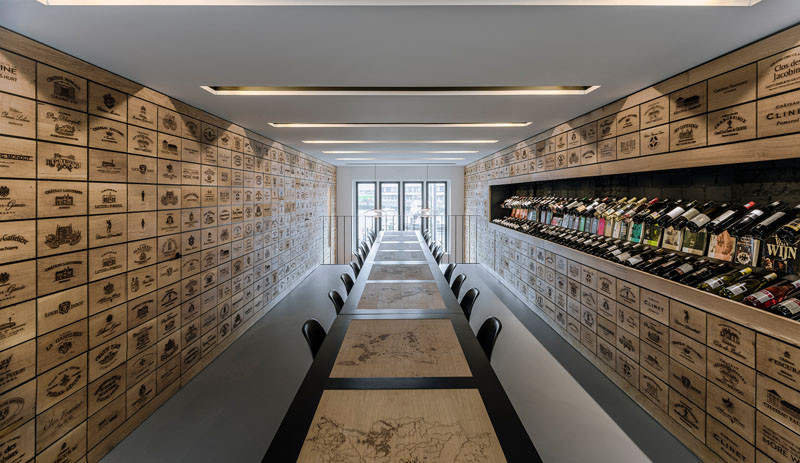 2100 Engraved Oak Panels Line The Walls Of This New Wine Shop In Rotterdam