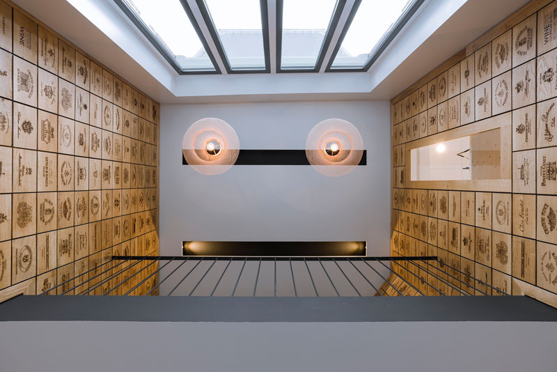 2100 Engraved Oak Panels Line The Walls Of This New Wine Shop In Rotterdam