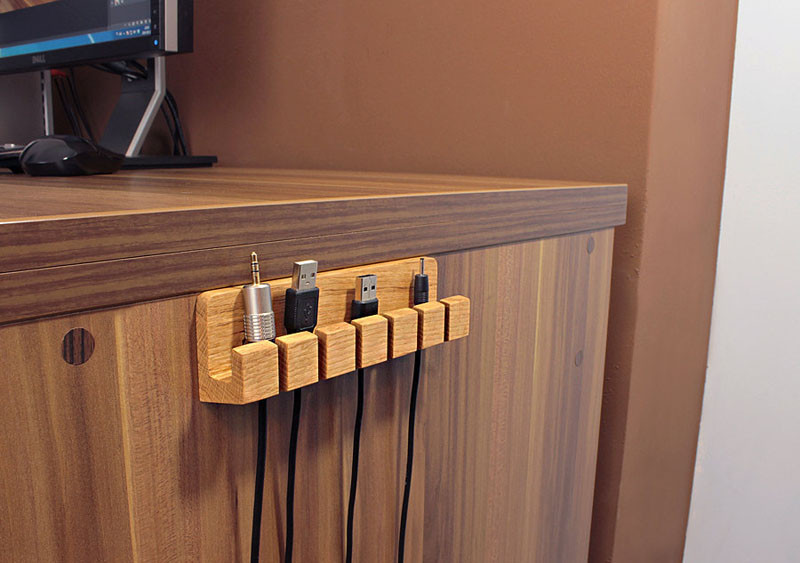 11 Holders That Stop Your Cables Falling Off Your Desk