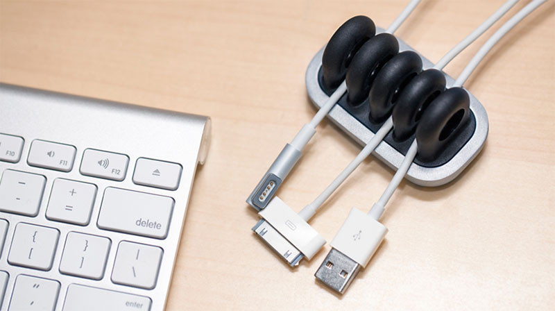 11 Holders That Stop Your Cables Falling Off Your Desk