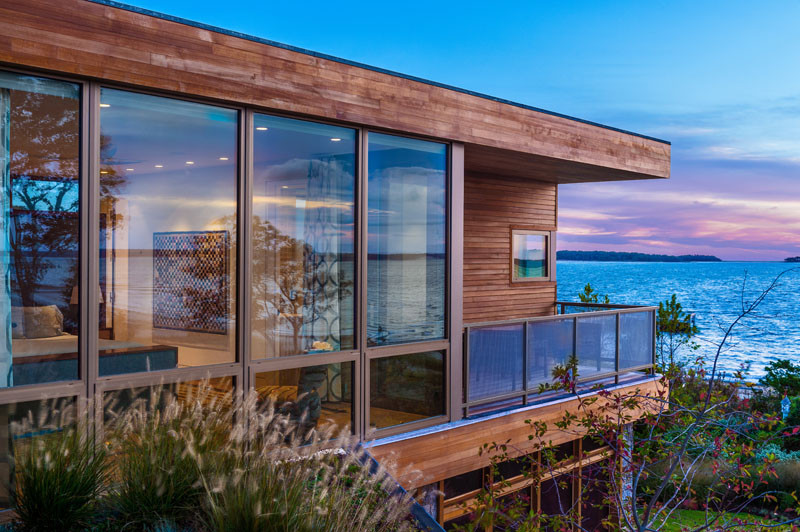 This wood and stone house overlooks the New York coastline