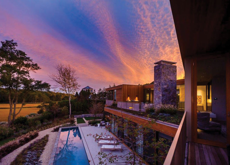 This wood and stone house overlooks the New York coastline