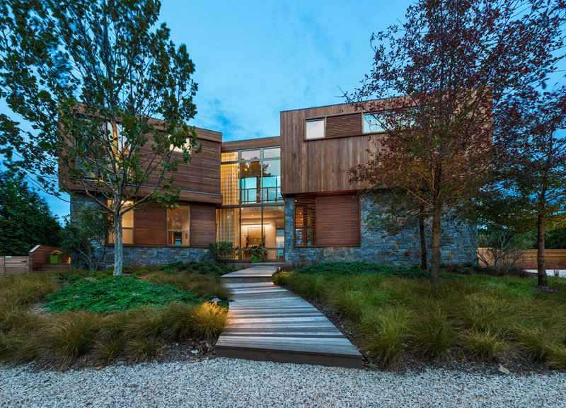 This wood and stone house overlooks the New York coastline