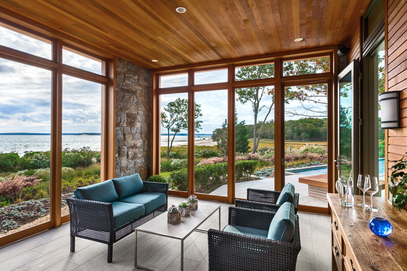 This wood and stone house overlooks the New York coastline