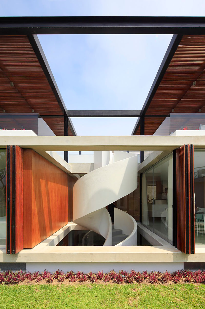 The spiral stairs in this home lead to an amazing rooftop deck