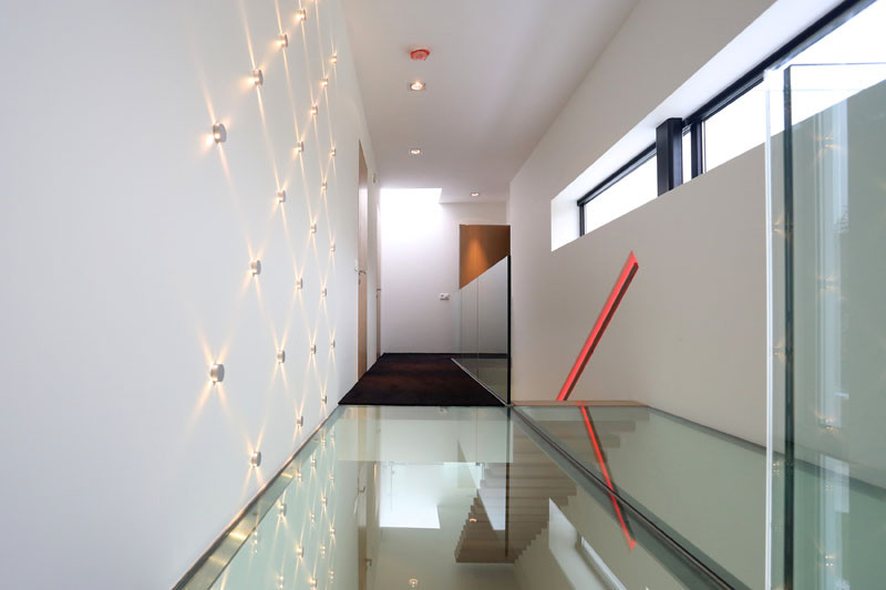 This staircase handrail has been designed to change colors using LED lights.