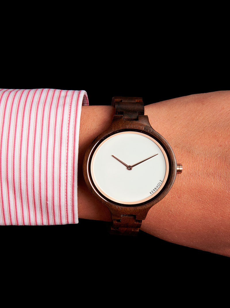 A modern round-faced wood watch. #ModenWoodWatches #Style #WoodWatches #Watches