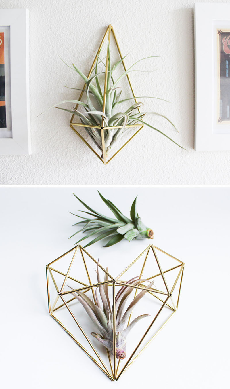 12 Elegant Ways To Bring Air Plants Into Your Home // These brass air plant holders, also known as a "himmeli", are a great way to add some art to your wall, while housing your air plant as well. #AirPlants #ModernHomeDecor #Planters #ModernDecor