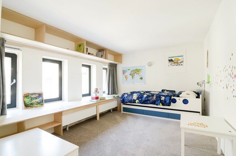 An old school building has been converted into a new apartment for a young family