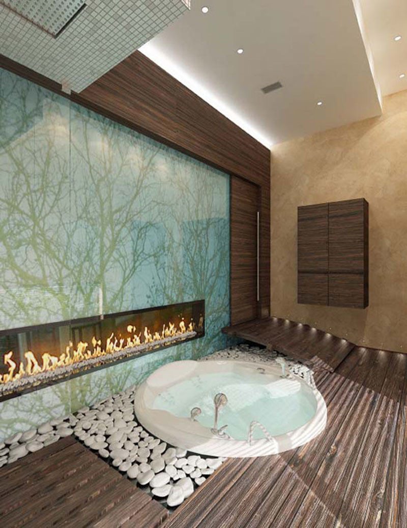 This bathroom includes a fireplace and white pebble stones.