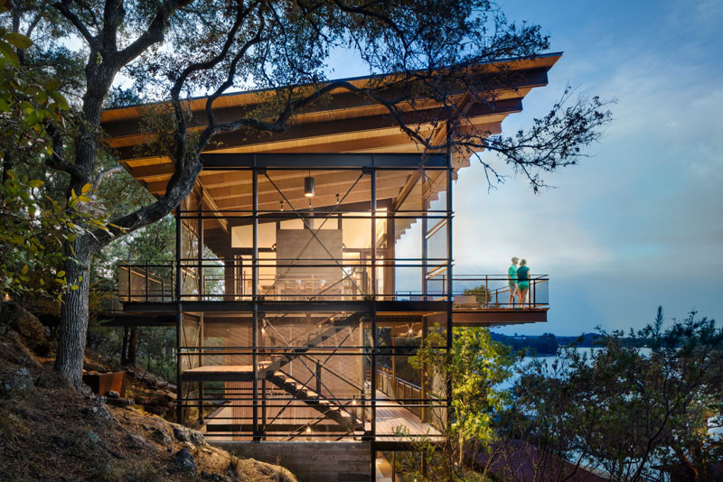 This home in Marble Falls, Texas is all about the water views. As the home is quite tall, living spaces are all on the the top floor, set just above the tree line and providing nearly a 180 degree view of the lake beyond. // Blue Lake Retreat by Lake|Flato Architects