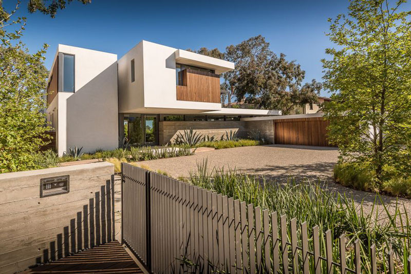 A landscaped front entrance welcomes you to this home in California.