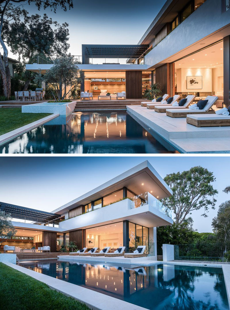 This home in the Pacific Palisades area of California, is designed for outdoor entertaining, with a large backyard, with swimming pool, outdoor kitchen and dining area, outdoor fireplace, and sun deck!