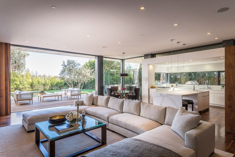 The living / dining areas and kitchen all share the same space in this Californian home.