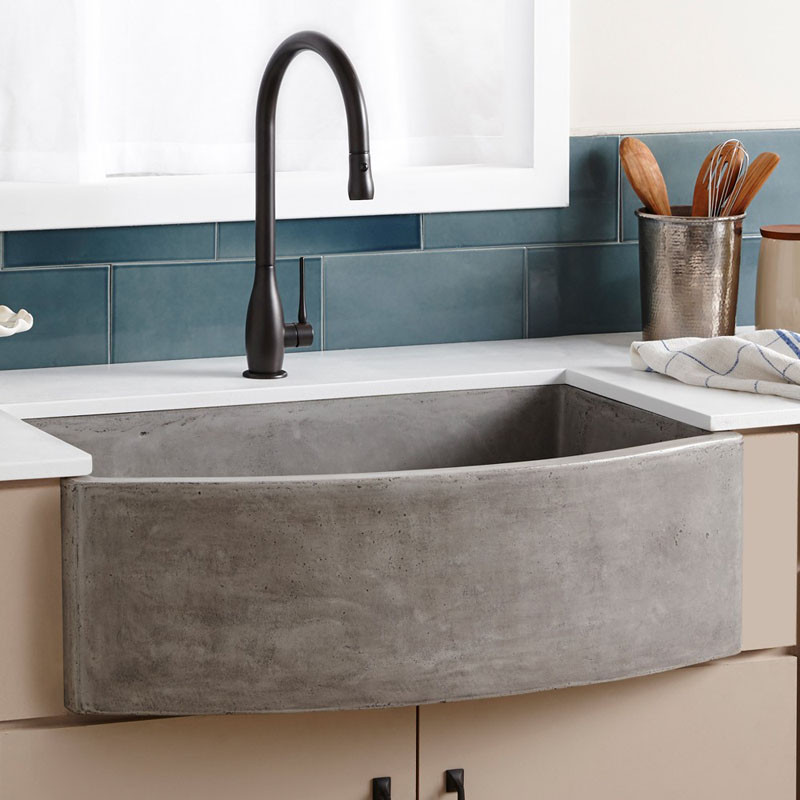 This farmhouse sink made from NativeStone, a combination of jute fiber and cement, adds a concrete touch to your kitchen.