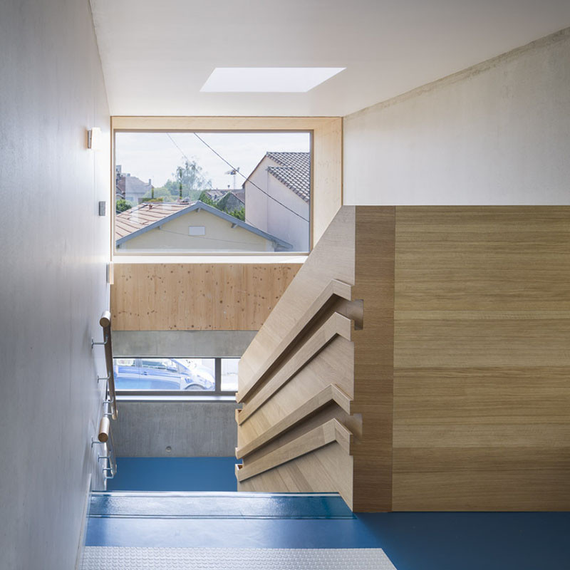 This daycare building has handrails for children and adults